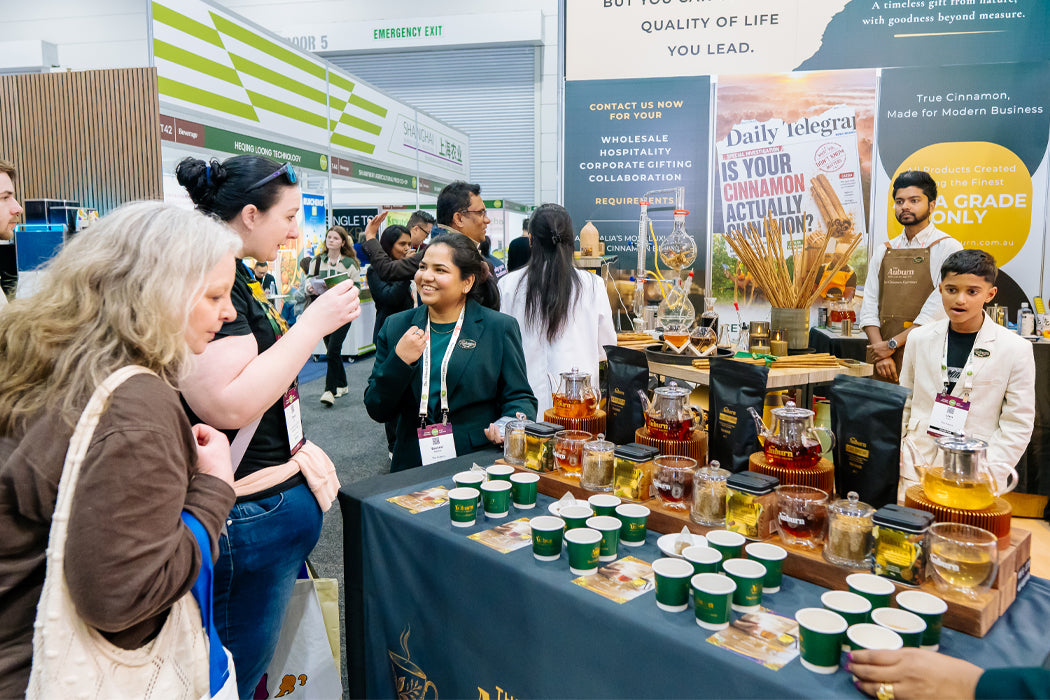 Visitors tasting Auburn brews at the stand