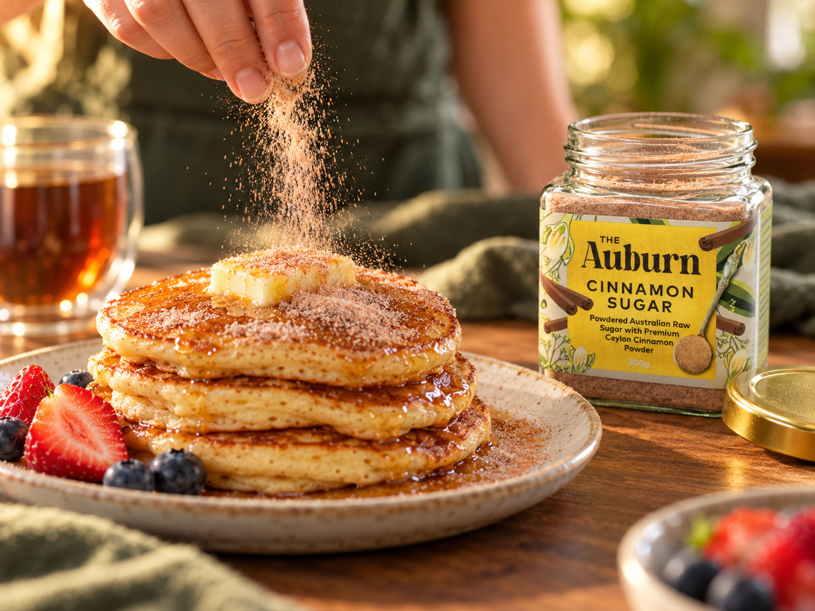 A stack of pancakes finished with Cinnamon Sugar